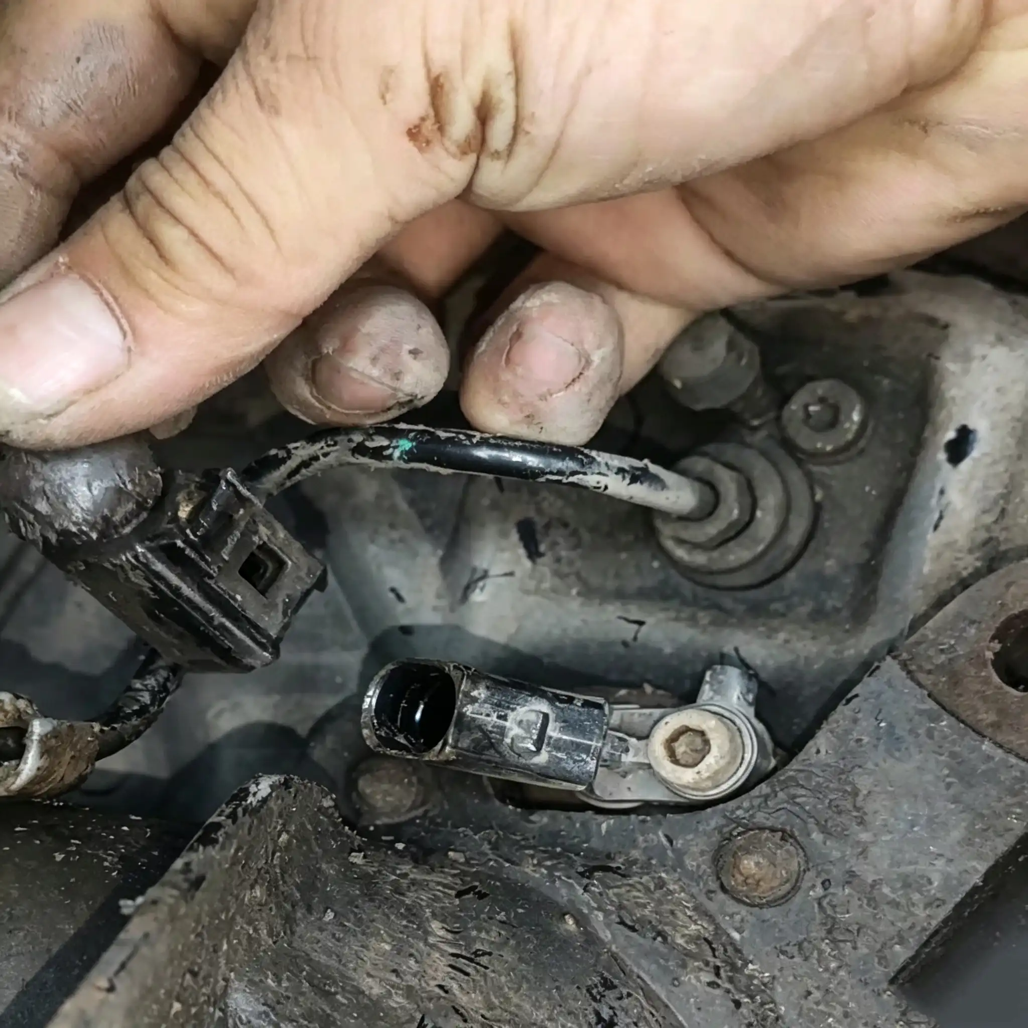 Disconnect the ABS sensor connector.